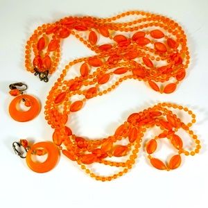 Cool vintage tangerine plastic bead necklace and hoop earring set. Hong Kong